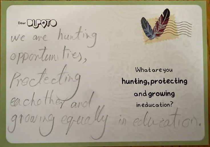 Handwritten postcard: we are seeking opportunities, protecting each other, and growing equally in education