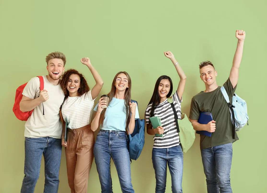 Five students celebrating together